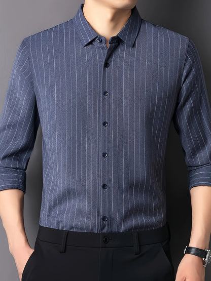 Centered front view of GKSEN blue pinstripe men’s shirt with structured collar, button front and clean tucked-in fit.
