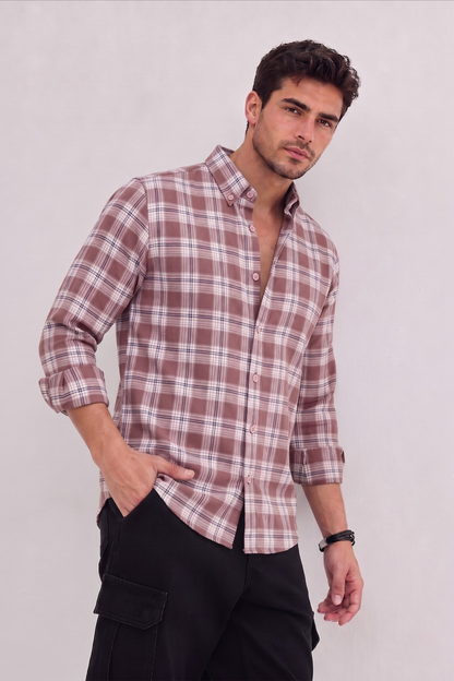 Model wearing GKSEN dusty mauve plaid check men’s shirt with rolled sleeves and black cargo pants.