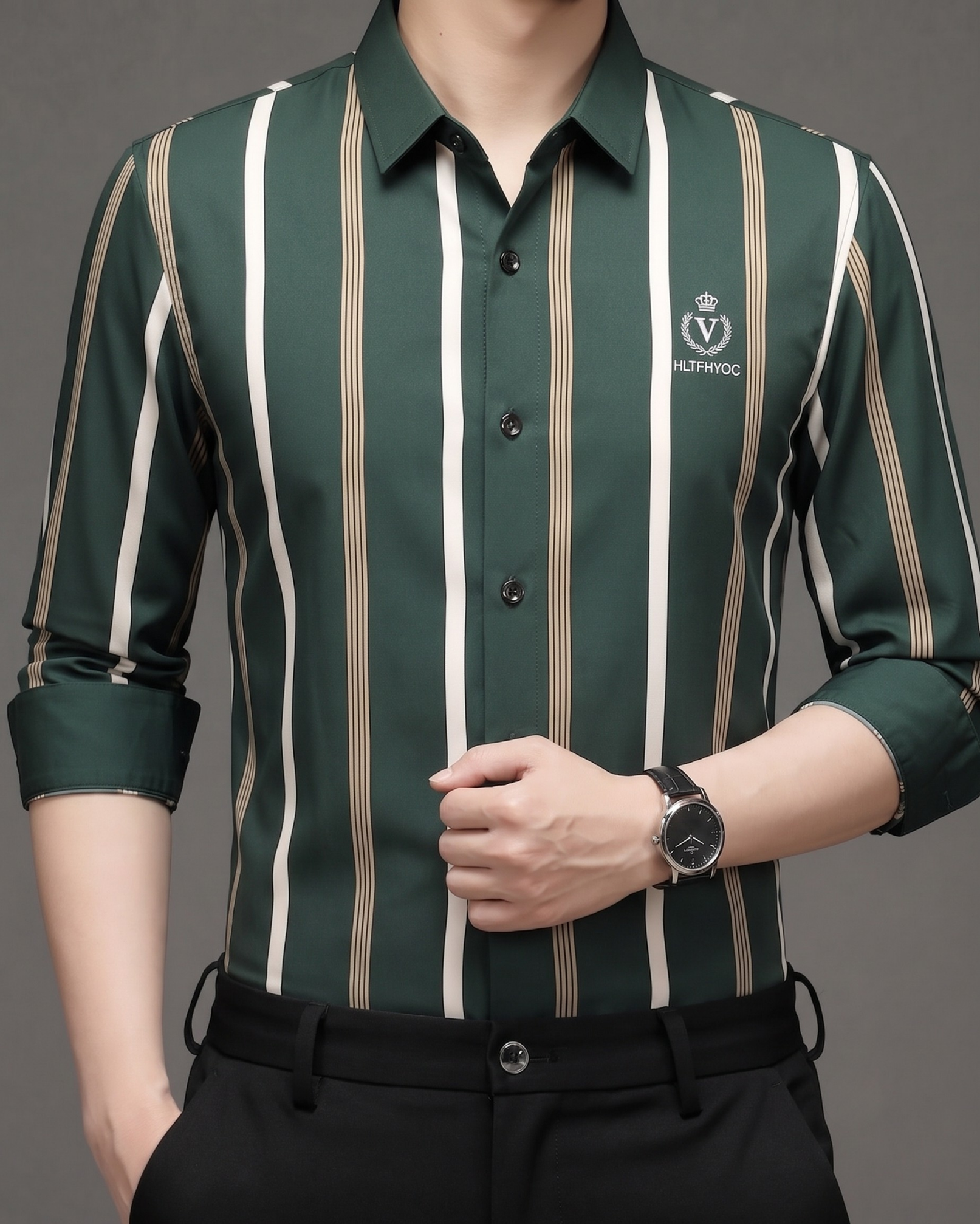 Model wearing GKSEN forest green striped men's shirt with ivory and beige vertical stripes and black trousers