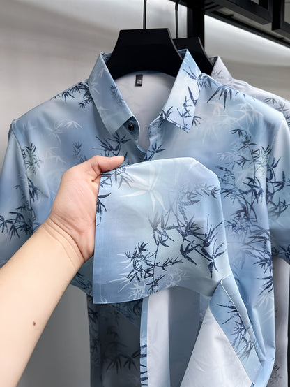 GKSEN ice blue botanical print men’s shirt shown with a close sleeve detail and bamboo leaf pattern on the fabric.