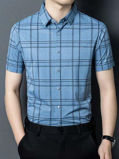 GKSEN powder blue check men’s shirt shown in a clean front view with short sleeves, light buttons, and black trousers.