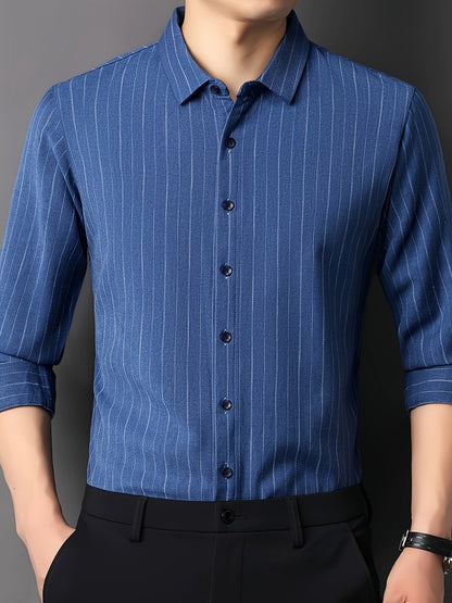 GKSEN men’s shirt in royal blue vertical stripes shown in a clean front view with black trousers for a sharp formal look.
