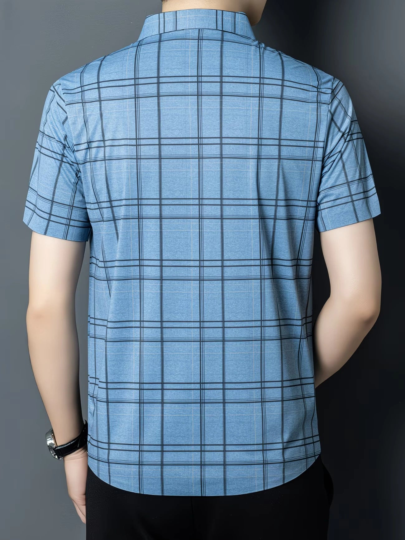 Back view of the GKSEN sky blue windowpane check men’s shirt showing the short sleeves, collar, and full grid check pattern.