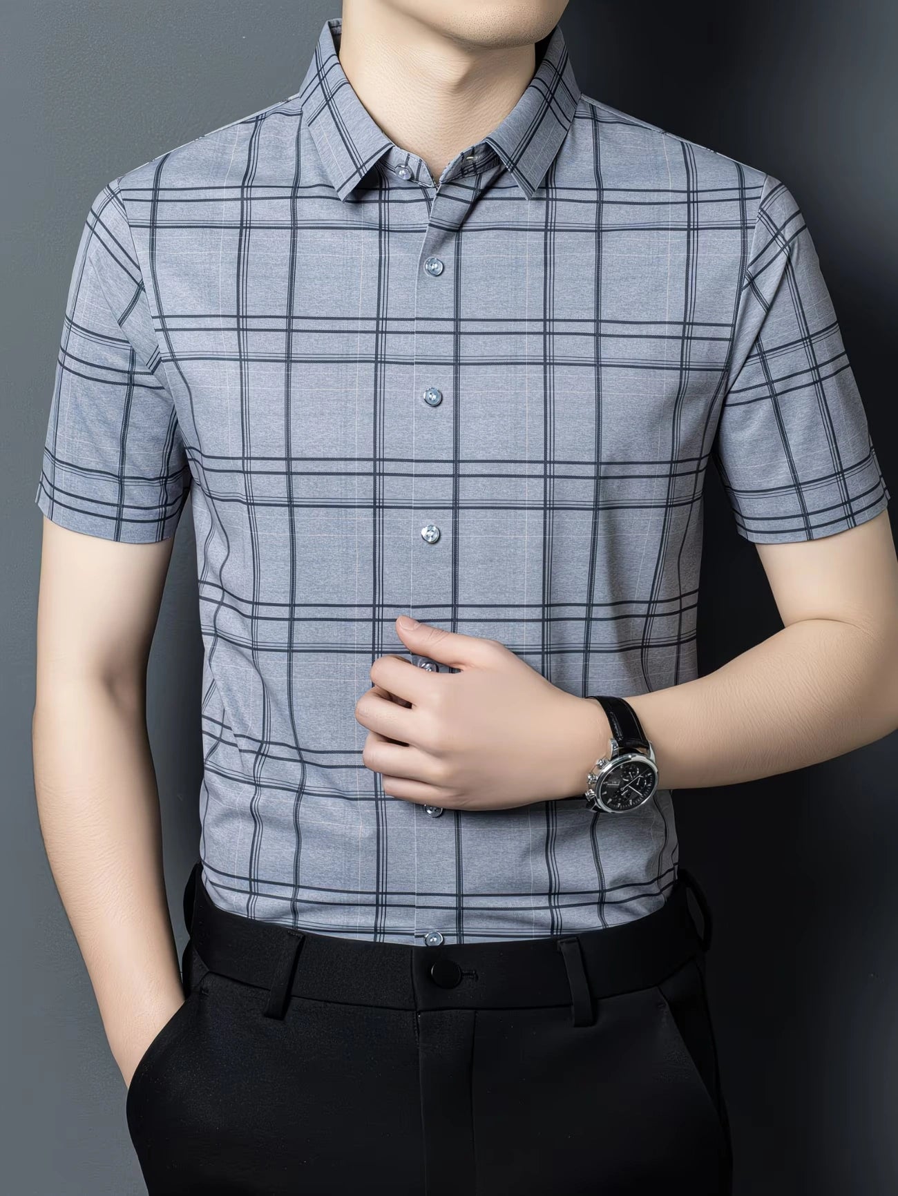 Close-up collar view of the GKSEN steel grey check men’s shirt showing the collar, neckline label, button, and grid check alignment.