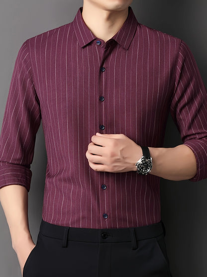 GKSEN wine burgundy vertical stripe men’s shirt shown in a three-quarter front model pose with rolled sleeves and collar detail.