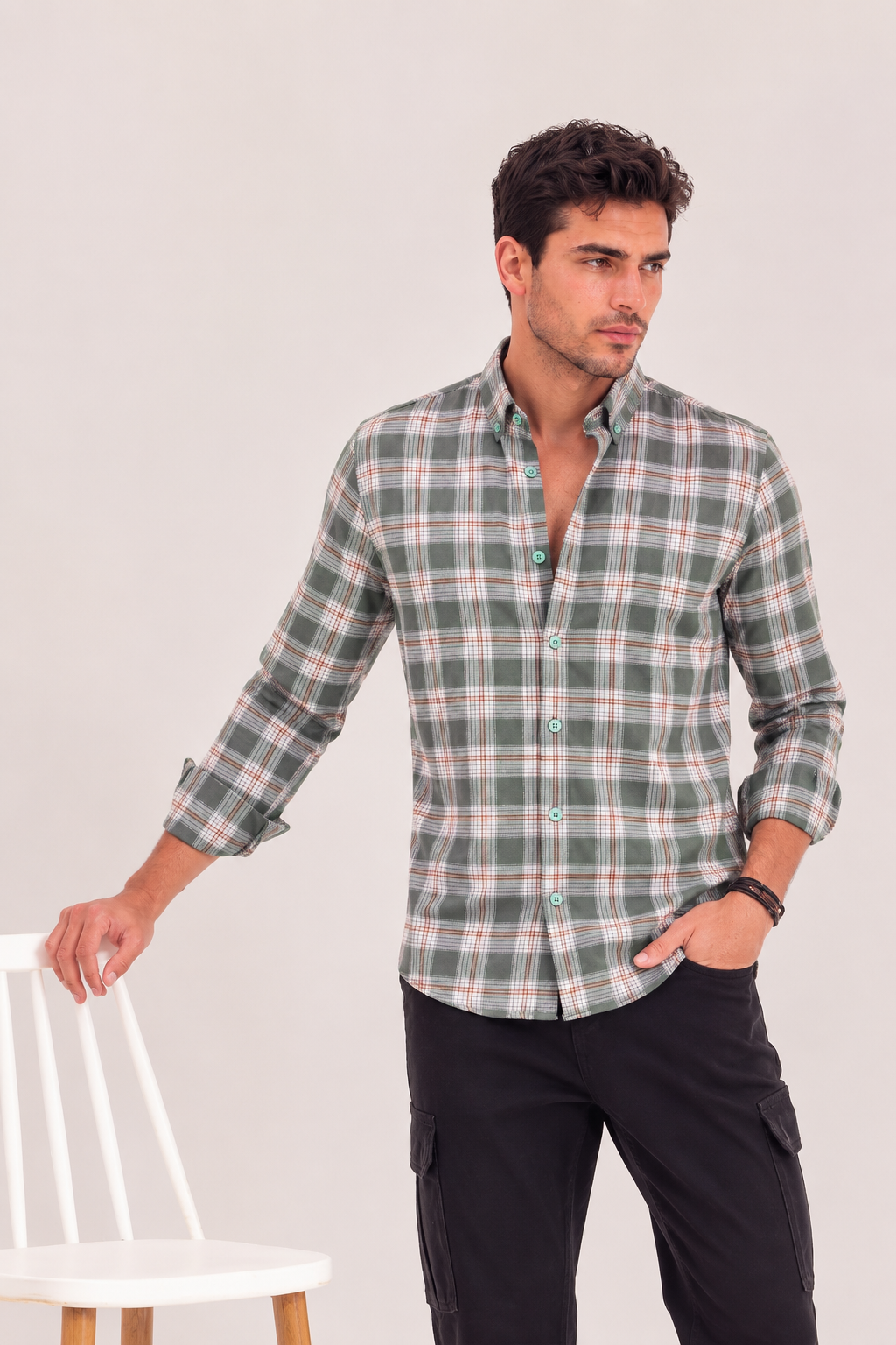 GKSEN olive green check shirt for men styled in a clean studio standing pose