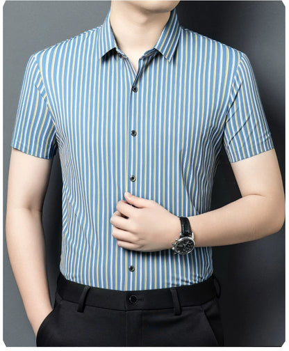 GKSEN men’s skyline blue fine stripe short sleeve shirt shown in a smart casual outfit.