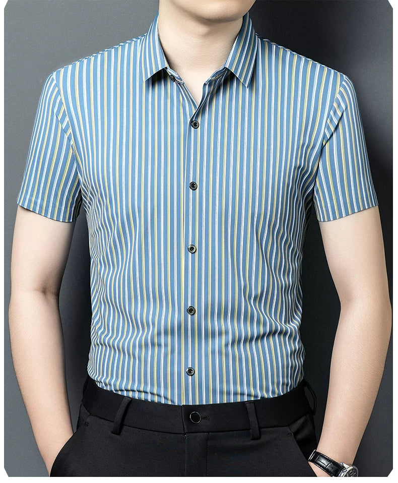 Front view of GKSEN blue vertical stripe half sleeve shirt styled with black trousers.