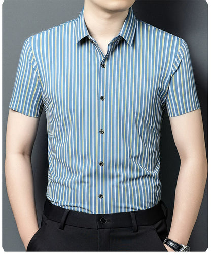 Front view of GKSEN blue vertical stripe half sleeve shirt styled with black trousers.