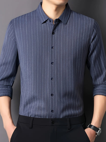 GKSEN steel blue pinstripe men’s shirt shown in front view with classic collar, dark buttons and rolled sleeve styling.